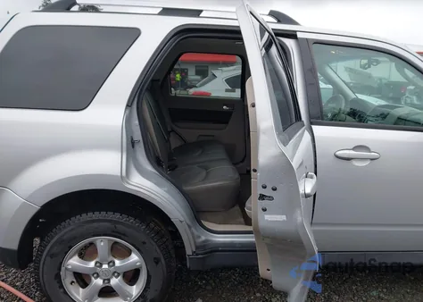 2009 Mazda Tribute Hybrid Grand Touring z USA, uszkodzony, nr VIN 4F2CZ59369KM00286